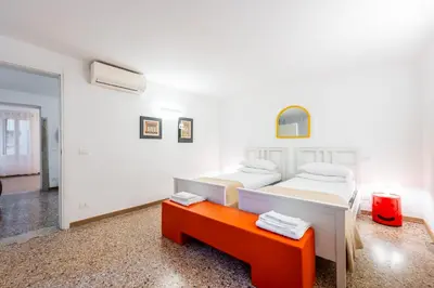 Letto o letti in una camera di AtoLiving Greci