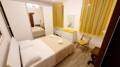 Letto o letti in una camera di Calle dei Guardiani Rooms