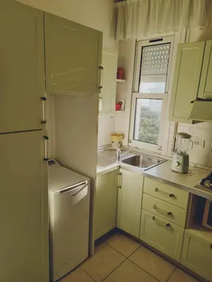 Cucina o angolo cottura di Condominio Maison Jolie- Solo per famiglie- Walterigato Apartments