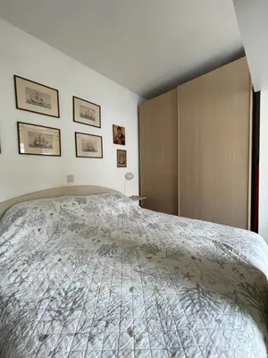 Letto o letti in una camera di Condominio Maison Jolie- Solo per famiglie- Walterigato Apartments