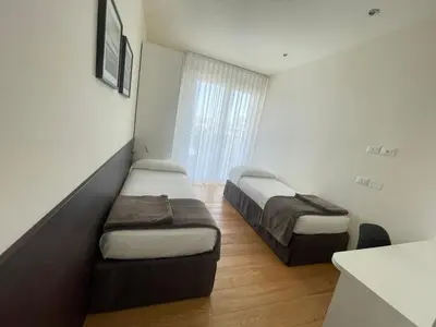 Letto o letti in una camera di Residenza Roma Marina 2