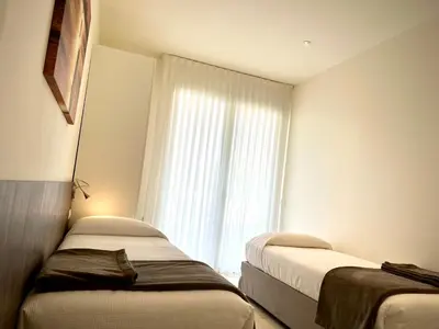 Letto o letti in una camera di Residenza Roma Marina 2