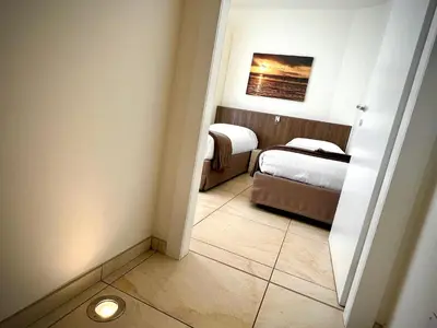 Letto o letti in una camera di Residenza Roma Marina 2