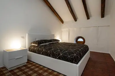 Letto o letti in una camera di Matteotti Gallery Venice Apt