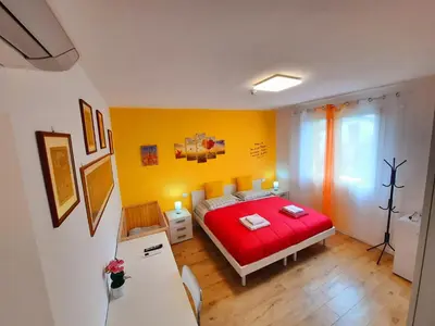 Letto o letti in una camera di New Bedrooms Mamma Gigetta
