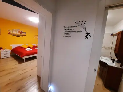 Letto o letti in una camera di New Bedrooms Mamma Gigetta