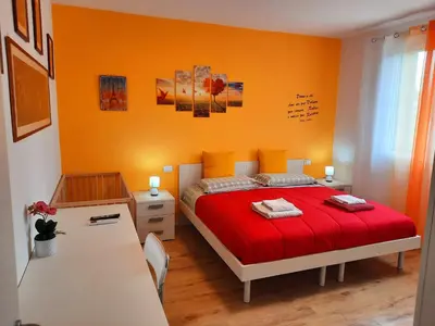 Letto o letti in una camera di New Bedrooms Mamma Gigetta