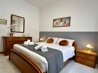 Letto o letti in una camera di NinaMar Giudecca Venice House