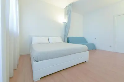 Letto o letti in una camera di Sweet HOME GEMMA