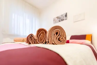 Letto o letti in una camera di In pochi minuti da Venezia