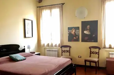 Letto o letti in una camera di Casa con terrazza in Campo San Tomà