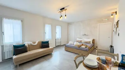 Letto o letti in una camera di The Grey Apartment