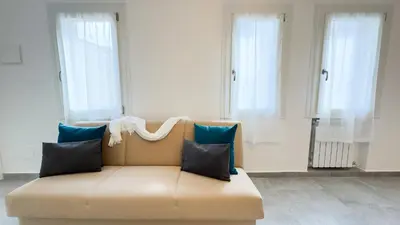 Area soggiorno di The Grey Apartment