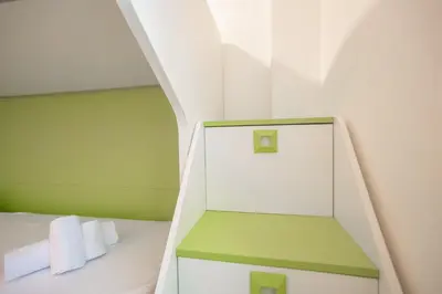 Letto o letti in una camera di Casa Faro 29