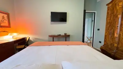 Letto o letti in una camera di Novo Taccheo by Ca-Sa Check