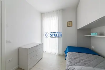 Letto o letti in una camera di Condominio Helga