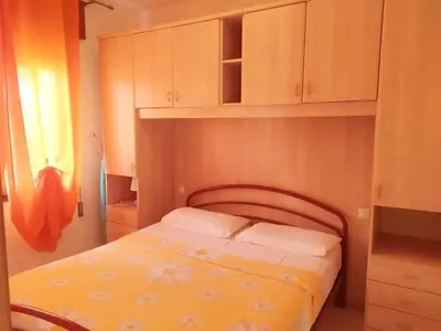 Letto o letti in una camera di Apartments in Rosolina Mare 48309
