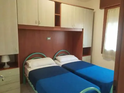 Letto o letti in una camera di Holiday Homes in Rosolina Mare 48310