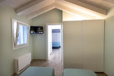TV o dispositivi per l'intrattenimento presso Appartamenti Incanto e MaGiCà - Casa Boscolo Luxury