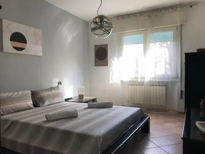 Letto o letti in una camera di Casa Rita