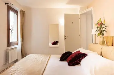 Letto o letti in una camera di Venice Gold room
