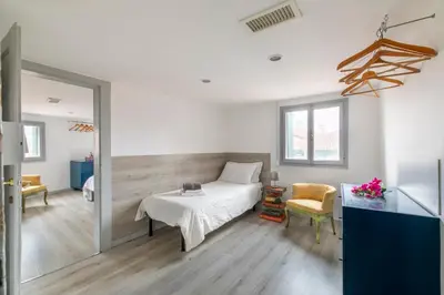 Letto o letti in una camera di Attic San Marco for 5 Person - AC - Wifi