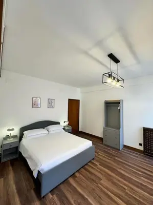 Letto o letti in una camera di madoneta apartment