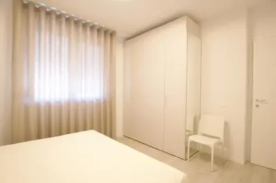 Letto o letti in una camera di Cigno Bianco - Home Immobiliare