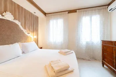 Letto o letti in una camera di San Marco Suite by Bricola Apartments