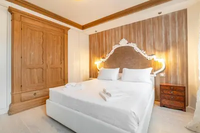 Letto o letti in una camera di San Marco Suite by Bricola Apartments