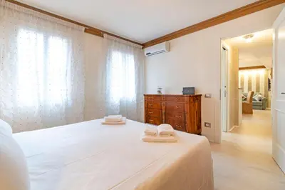 Letto o letti in una camera di San Marco Suite by Bricola Apartments