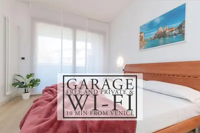 Letto o letti in una camera di [10 min from Venice] [Free Garage] Lovely flat