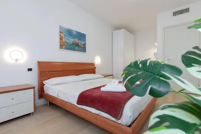 Letto o letti in una camera di [10 min from Venice] [Free Garage] Lovely flat