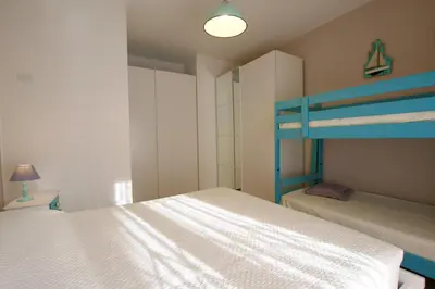 Letto o letti in una camera di Pagoda - Home Immobiliare