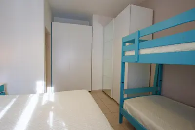 Letto o letti in una camera di Pagoda - Home Immobiliare