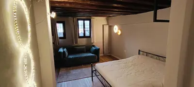Letto o letti in una camera di Piccola Perla sul Canale