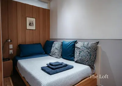 Letto o letti in una camera di The Lovers' Loft