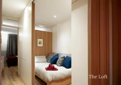 Letto o letti in una camera di The Lovers' Loft