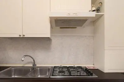 Cucina o angolo cottura di enJoy Home - Appartamento Orologio, Piazza dei Signori