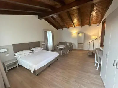 Letto o letti in una camera di La Casetta