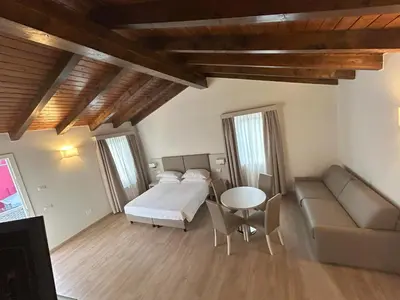 Letto o letti in una camera di La Casetta
