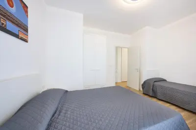 Letto o letti in una camera di Union Apartments