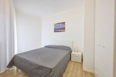 Letto o letti in una camera di Union Apartments