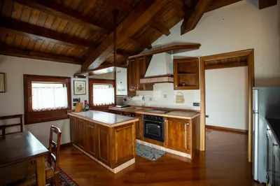 Cucina o angolo cottura di Chalet del Mare VISTA CANALE