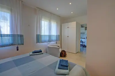 Letto o letti in una camera di Alba Apartment