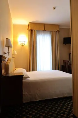 Letto o letti in una camera di Hotel Ristorante Ca' Nova