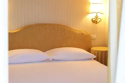 Letto o letti in una camera di Hotel Ristorante Ca' Nova