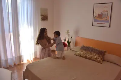 Letto o letti in una camera di Immobiliare Al Ponte