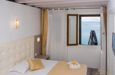 Letto o letti in una camera di Locanda Stravedo