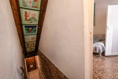 Letto o letti in una camera di Casa Trecento